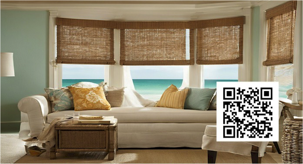 A couch with pillows in a room with a view of the ocean in article. Provided by Better Blinds in Ocean View & Millsboro DE