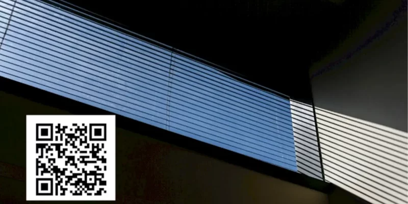 Coastal Delaware living room with sunlight fading window blinds