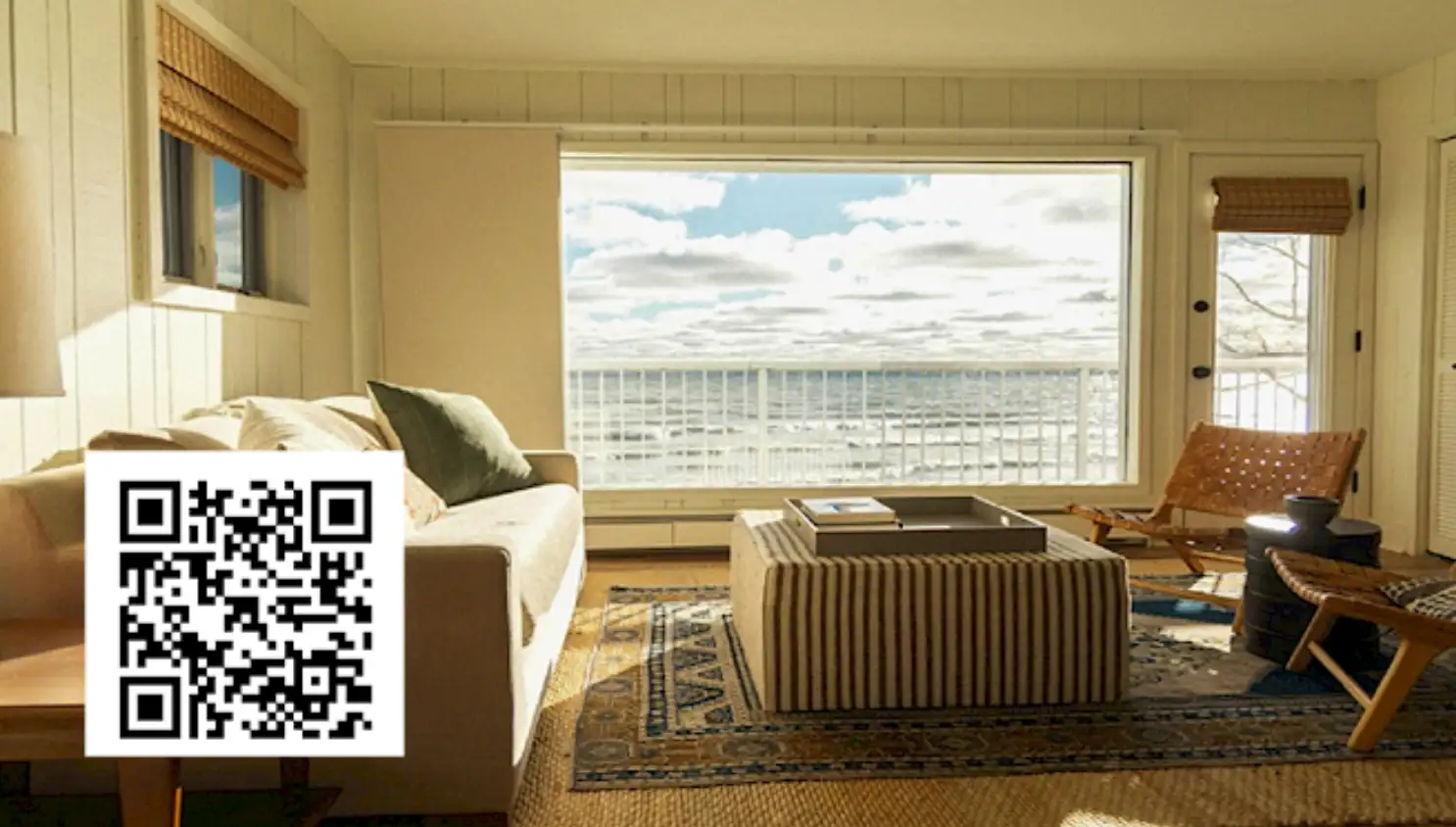 Image of living room with cellular shades reducing summer heat inside Delaware home